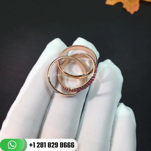 Trinity ring, medium model, 18K white gold, 18K rose gold, 18K yellow gold. Width: 3.53mm.