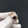REF . 345208 Serpenti one-coil ring in 18 kt rose gold, set with black onyx elements and demi pavé diamonds.