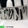 panthere-de-cartier-tiger-bracelet-in-white-gold-with-diamonds-and-emeralds-eyes