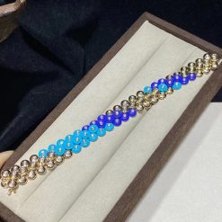 van-cleef-arpels-bouton-dor-bracelet-yellow-gold-turquoise-and-lapis-lazuli-vcaro6w400